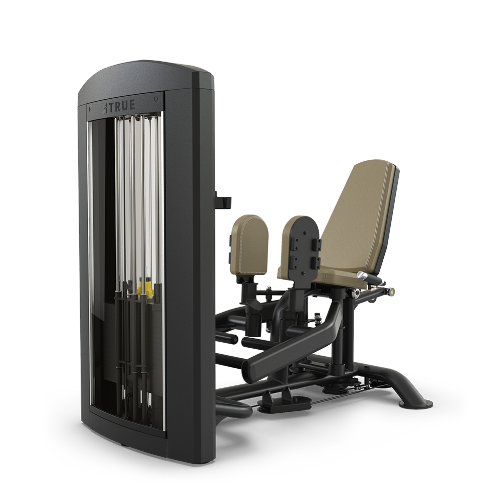 A seated hip abduction gym machine with padded seats, adjustable resistance stack, and two padded leg supports, designed for lower body workouts. The equipment is black and tan with a sturdy frame.