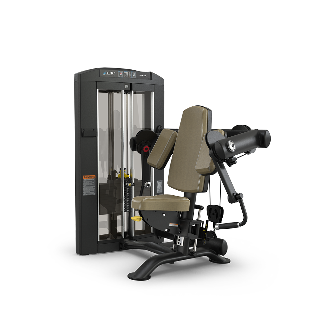 A black and gray gym machine with padded brown seats and backrest, designed for weight-based leg and knee exercises, featuring adjustable components and a vertical weight stack.