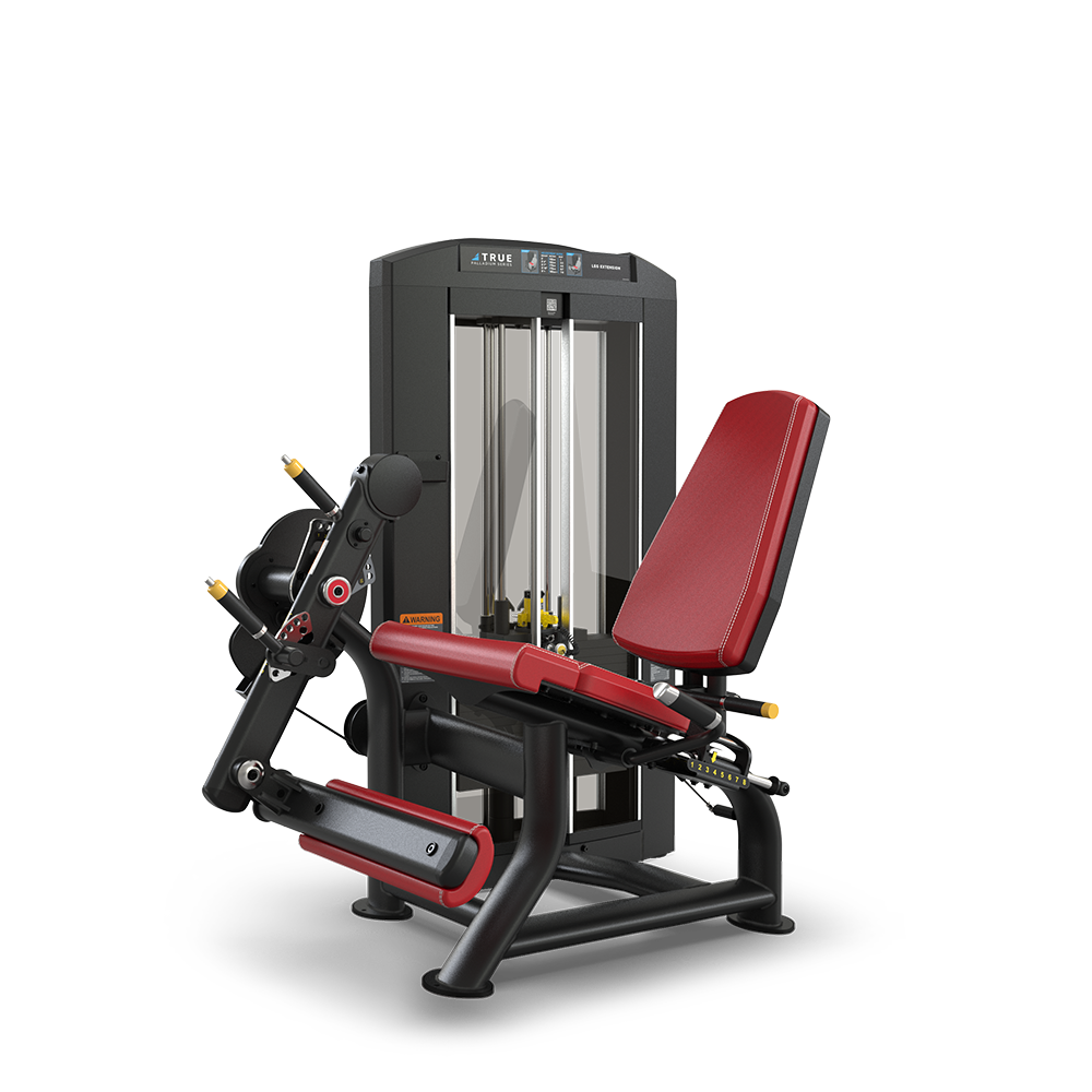 A leg extension machine with a black frame, red padded seat, and red leg support, used for strength training exercises targeting the quadriceps. The machine has adjustable settings and a weight stack at the back.