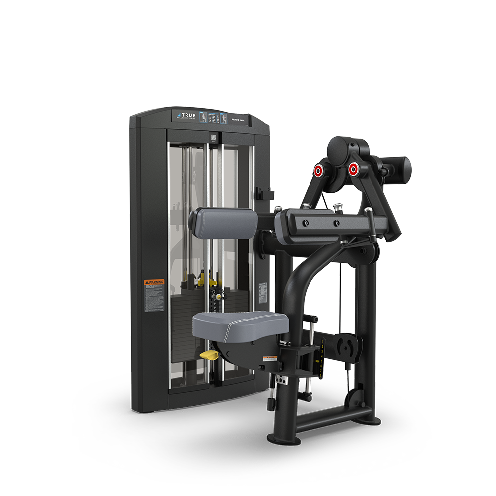 A black and gray strength training machine with padded seat and arm support, adjustable weights, and instructional labels, designed for performing isolated arm or leg exercises in a gym setting.