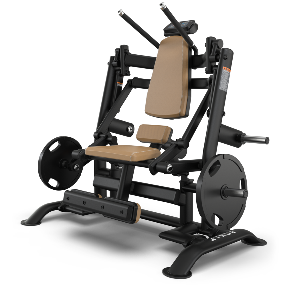 A black and tan seated gym machine with padded backrest and seat, designed for weight plate loading. It has handles, foot supports, and adjustable arms for performing chest press exercises.