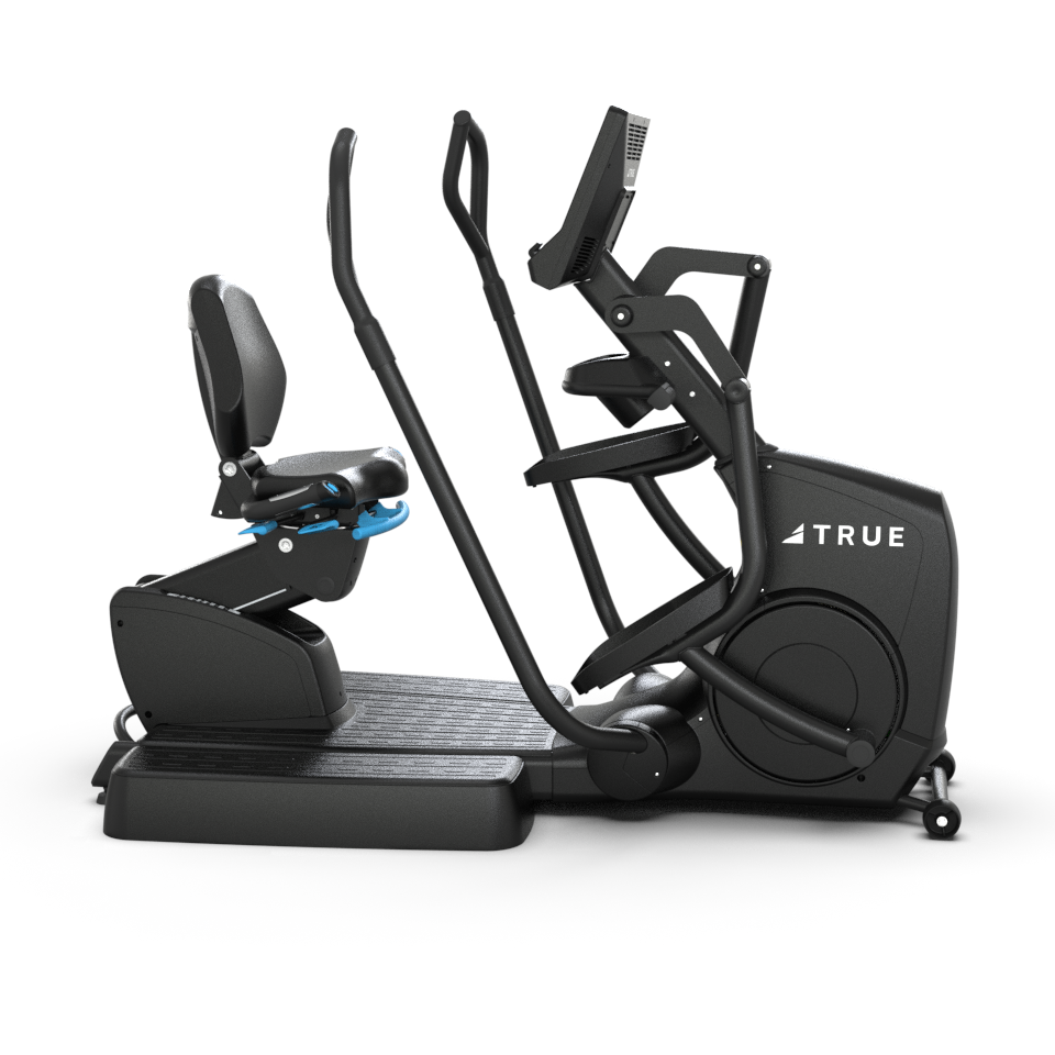 A black recumbent stepper exercise machine with a seat, handlebars, foot pedals, and a digital display, labeled TRUE, on a white background.