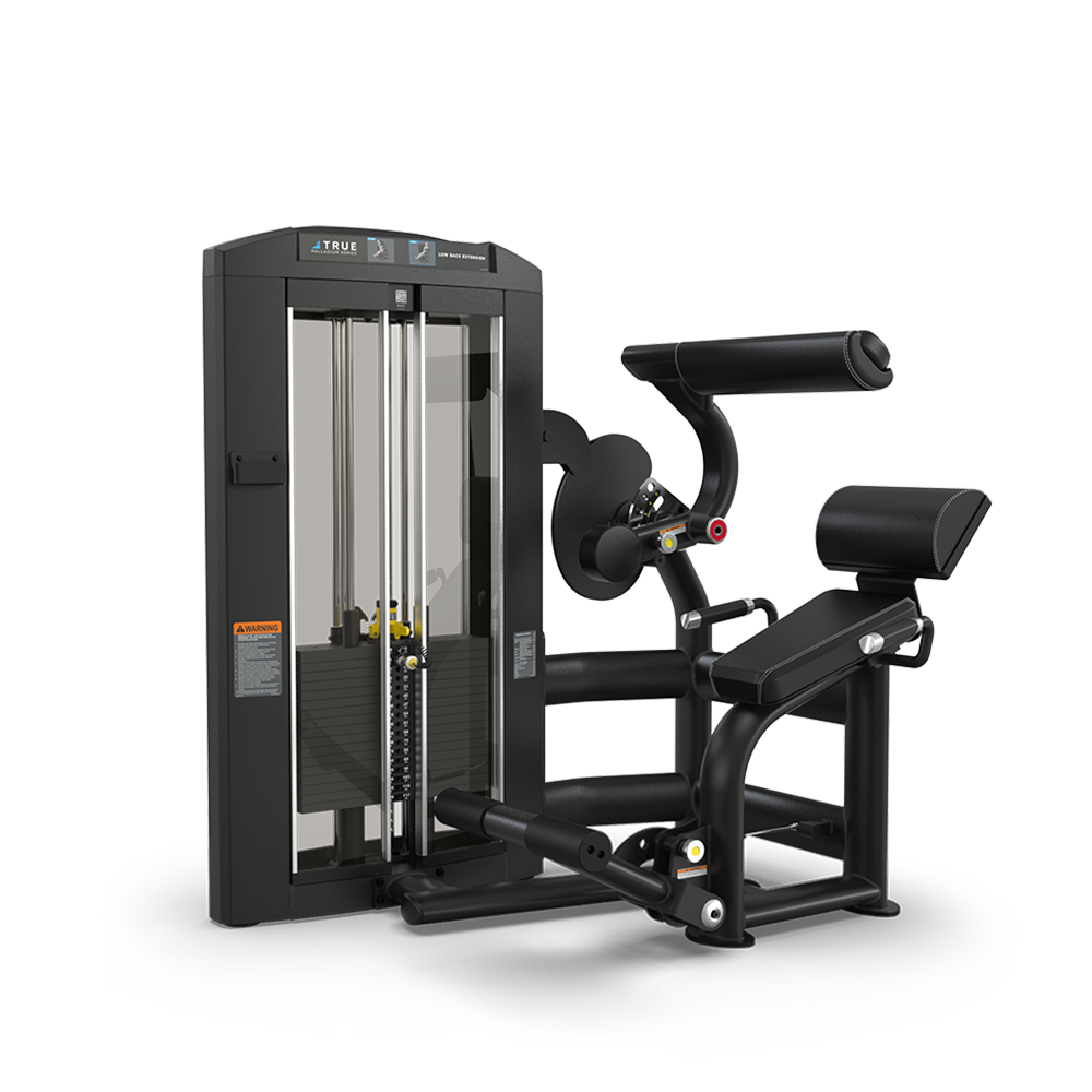 A black seated gym machine with padded supports and adjustable weights, designed for isolating and exercising the lower back muscles, set against a plain white background.