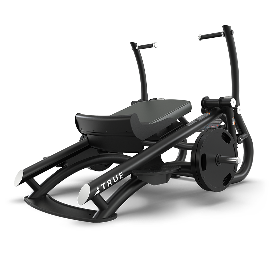 A black commercial-grade fitness machine with a seat, foot platforms, and handles, designed for strength training exercises, with a plate-loaded system and the brand name TRUE visible on the frame.