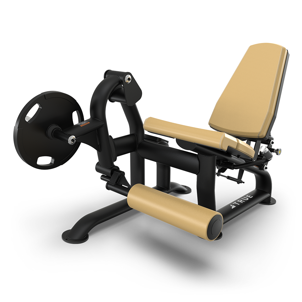 A beige and black leg extension machine with padded seat and leg pads, designed for gym use, on a white background.