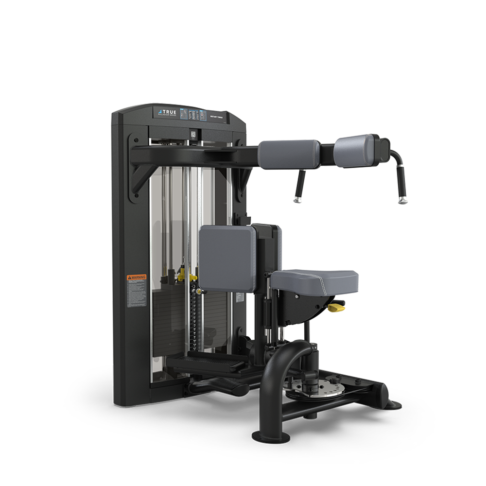 A black and gray gym machine with padded seats, backrests, and arm pads, designed for performing ab crunch and back extension exercises, set against a plain white background.