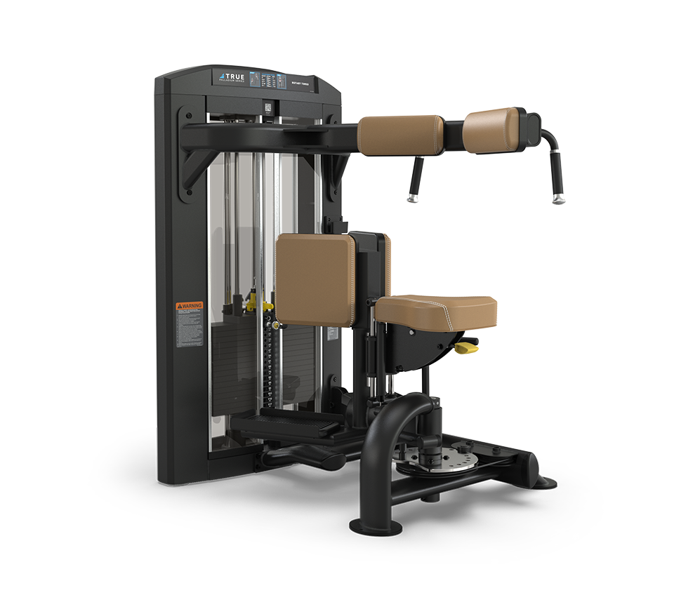 A seated gym machine with padded brown cushions and black frame, designed for inner and outer thigh exercises, featuring adjustable weight stack and instructional placards.