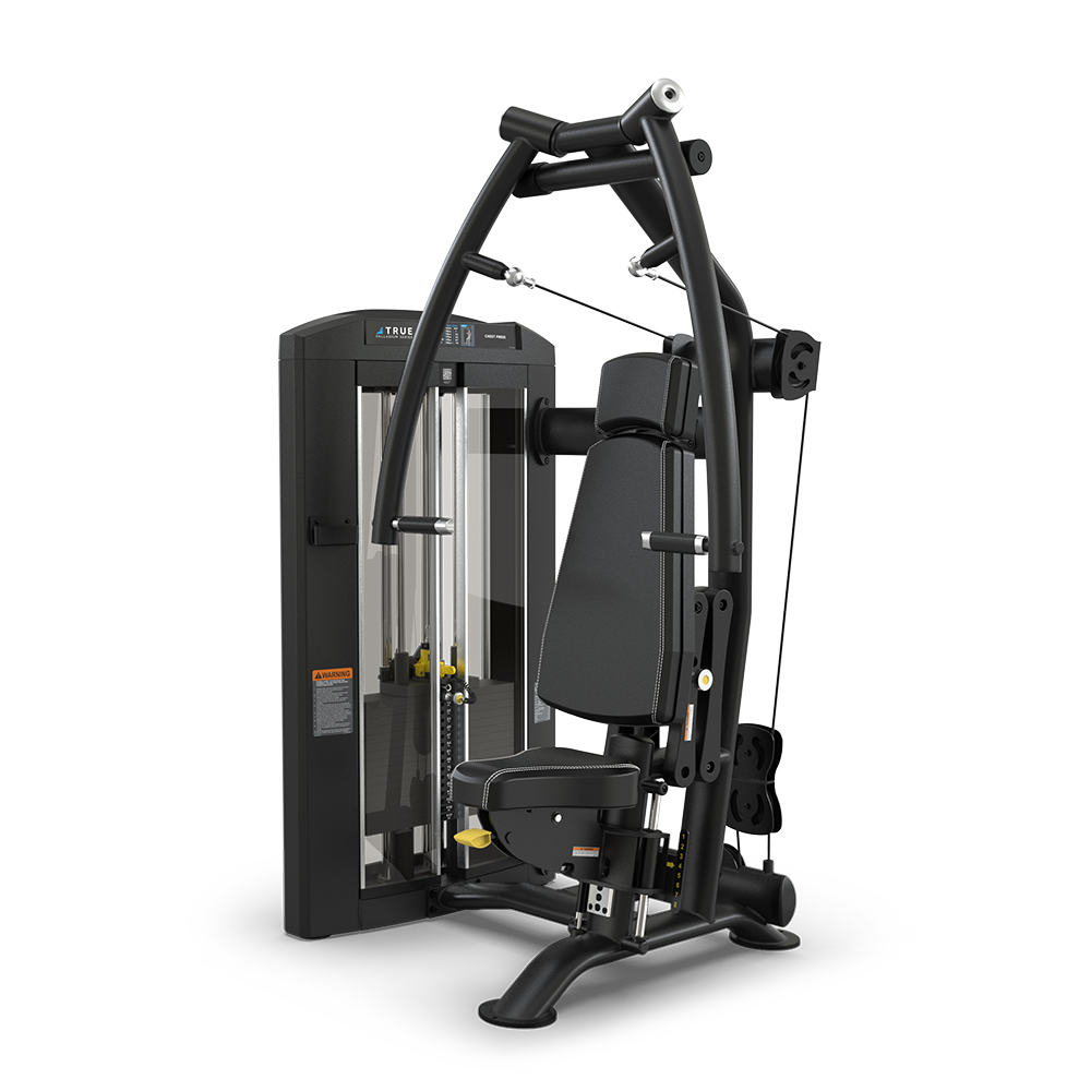 A black multi-functional gym machine with a padded seat, adjustable weights, and arm handles, designed for strength training exercises. The machine features cables, pulleys, and a sleek, modern frame on a white background.