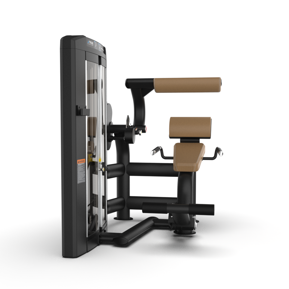 A commercial gym machine designed for back extension exercises, featuring padded leg and back supports with brown cushions and a black metal frame, set against a plain white background.